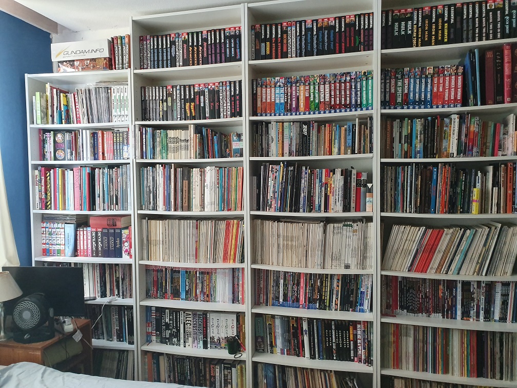 The four bookcases in my bedroom, loaded with manga, bande dessinee and comics